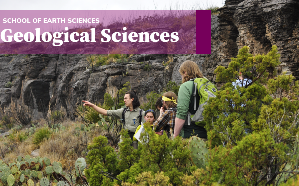 A group of students is photographed as they survey a land with a purple banner saying "Geological Sciences" in above them