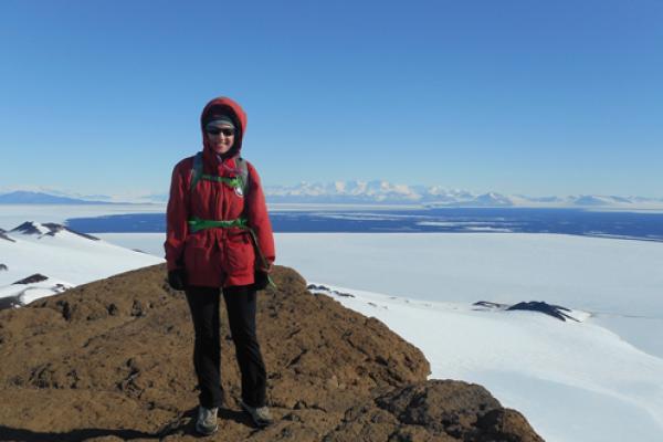 Earth Science student Elsa Saelens poses for a picture in frigid Antarctica
