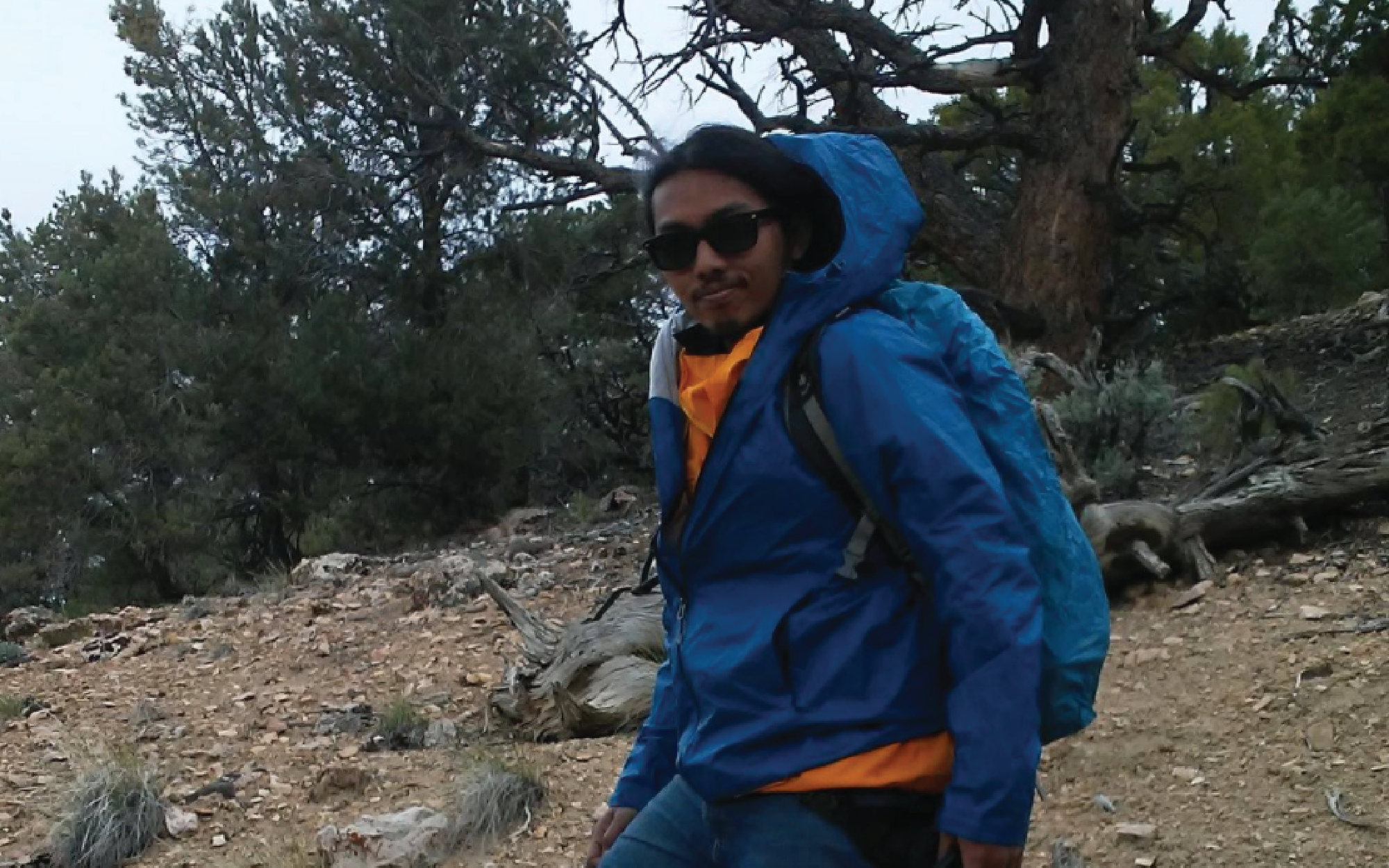 Graduate student Datu Adiatma hiking