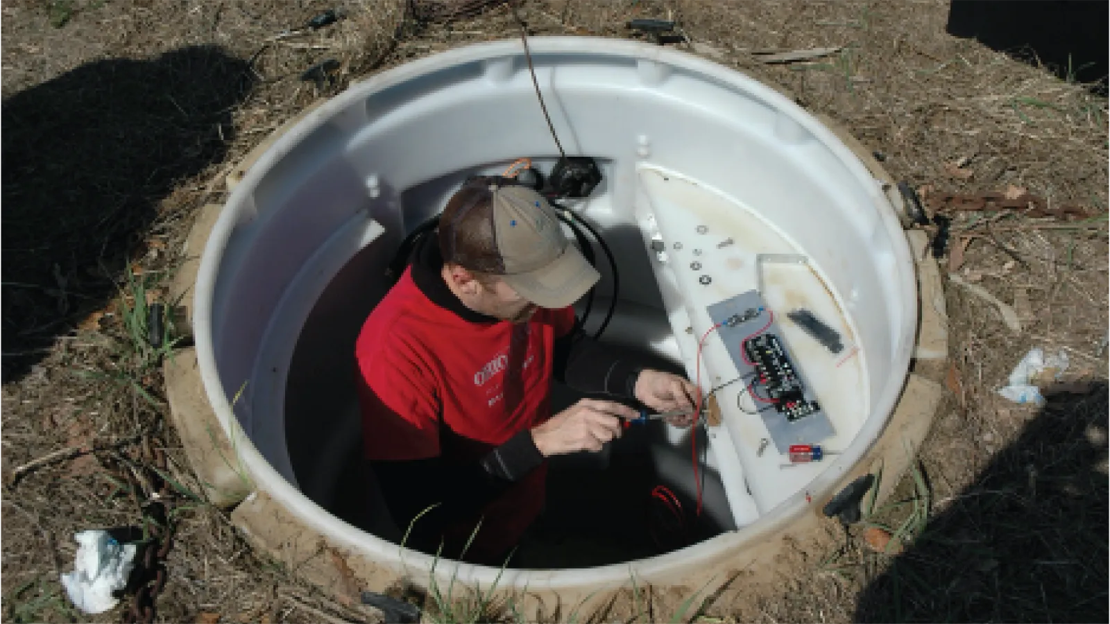 Jeff Fox doing field work in a hole