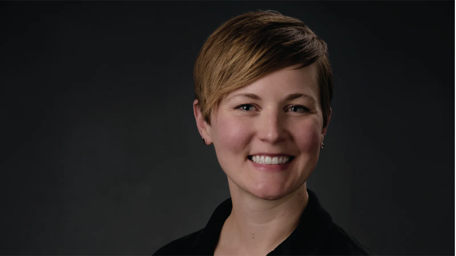 Professional headshot of Liz Miller