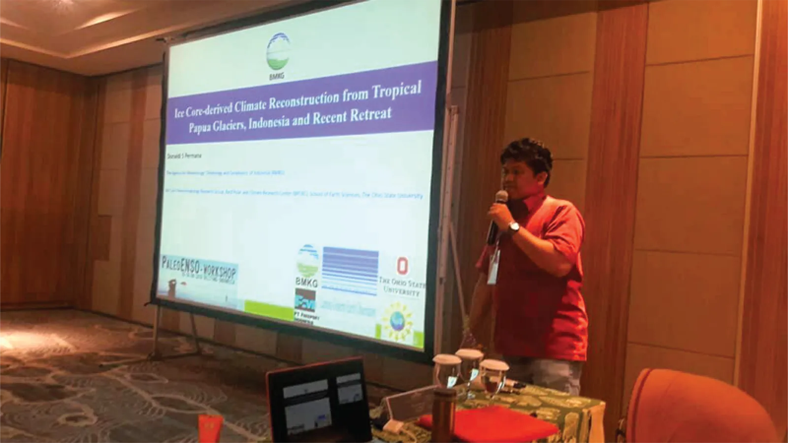 Donaldi Permana giving a presentation at a conference