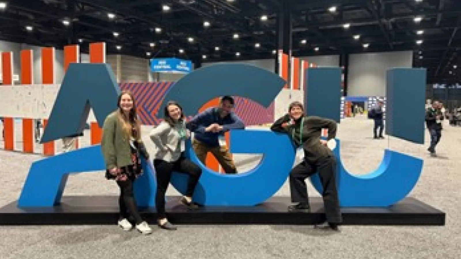 Photo of Professor Crowell and his research group at UW, taken at 2022 AGU Fall Meeting in Chicago.