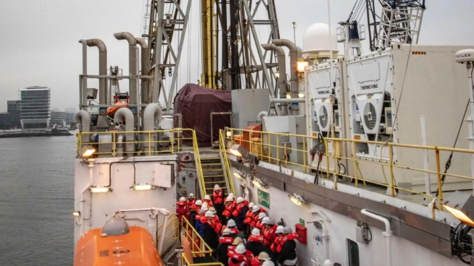 Participants of Expedition 401 during the first abandon ship safety drill. (Credit: Erick Bravo, IODP JRSO)