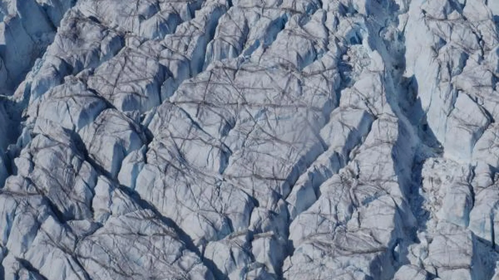 Crevasses at Store Glacier, a marine-terminating outlet glacier of the western Greenland Ice Sheet. Credit: Tom Chudley (Durham University)