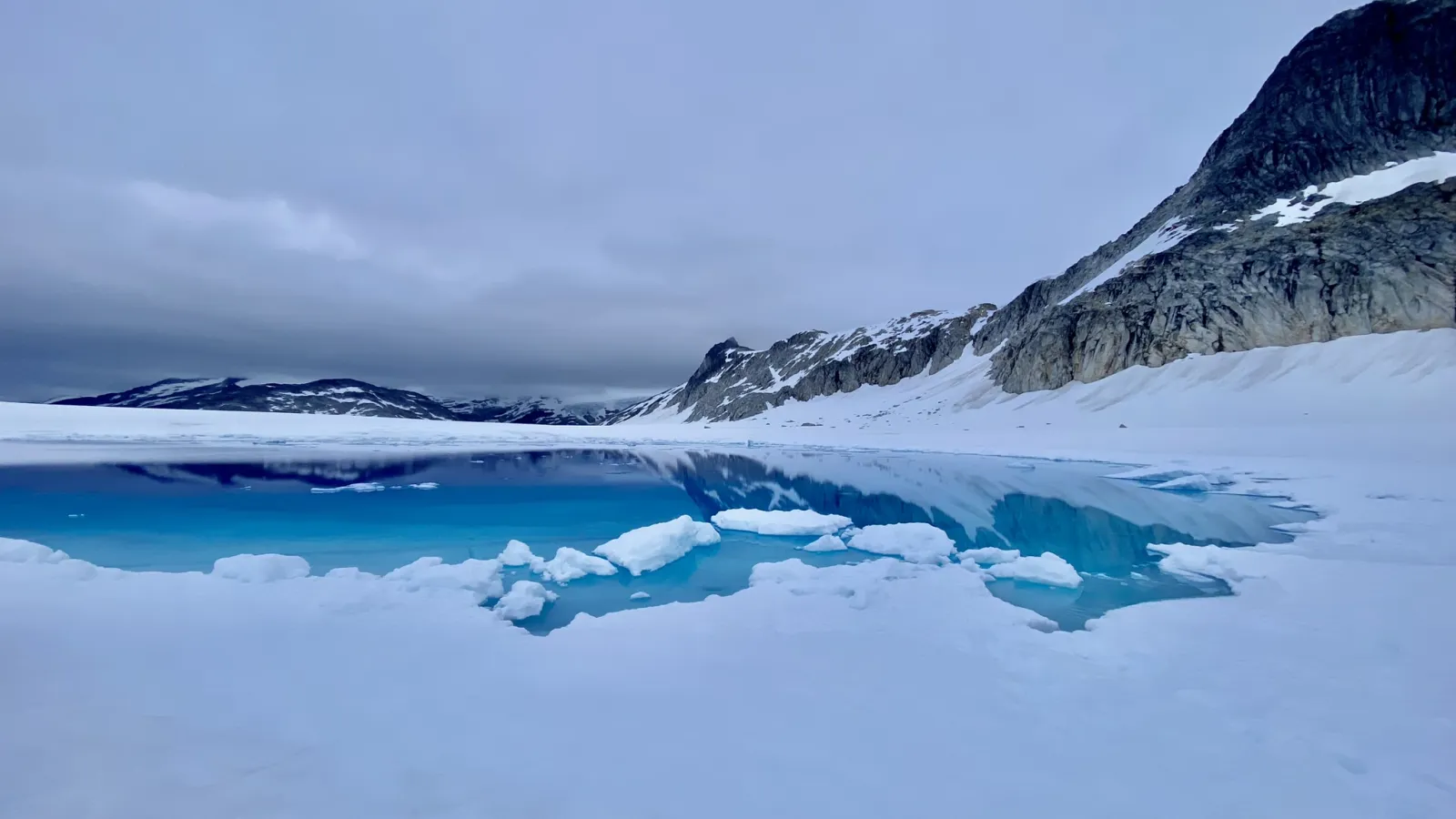 A surface water glacial melt pond on the Juneau Icefield