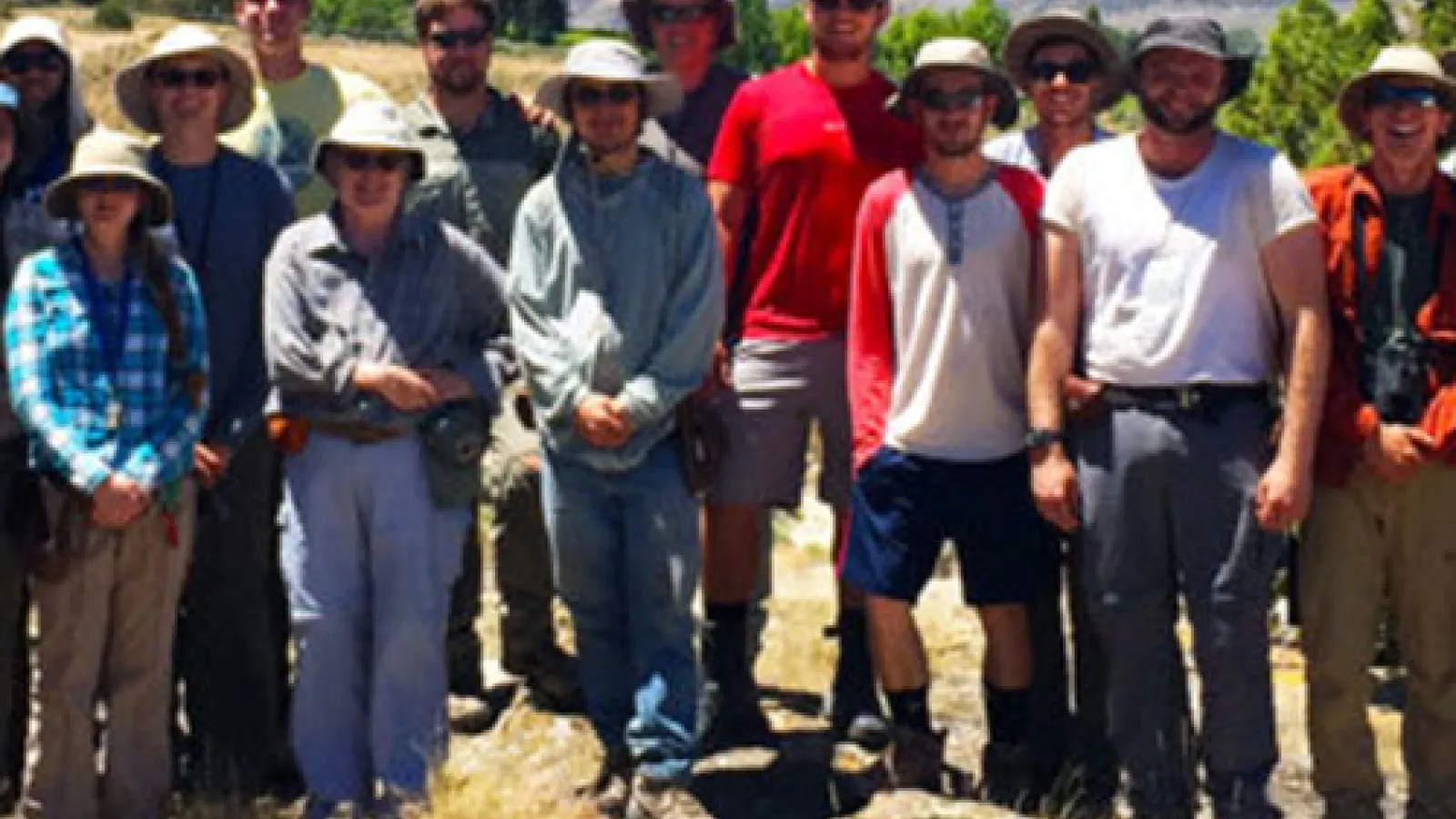 Geology majors and faculty gather behind Temple Hill during field camp.