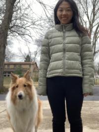 Yue Zhang with a dog