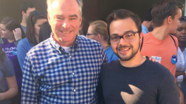 Brian O'Reilly smiles next to former 2016 VP candidate Tim Kaine