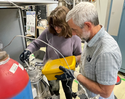 Prof. Cook loading a hydrate sample in a shear cell with Dr. Erik Spangenberg