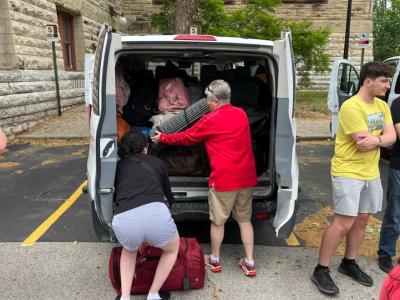 Shelley Judge packing with students before departure. 