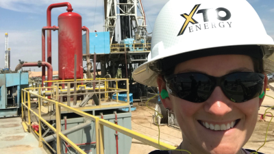 Julie Mansfield wearing a hardhat on a job site