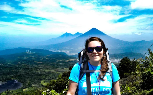 Girl in front of blue sky