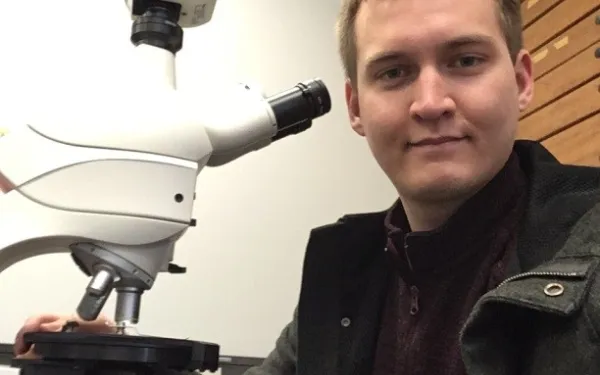 Man with microscope