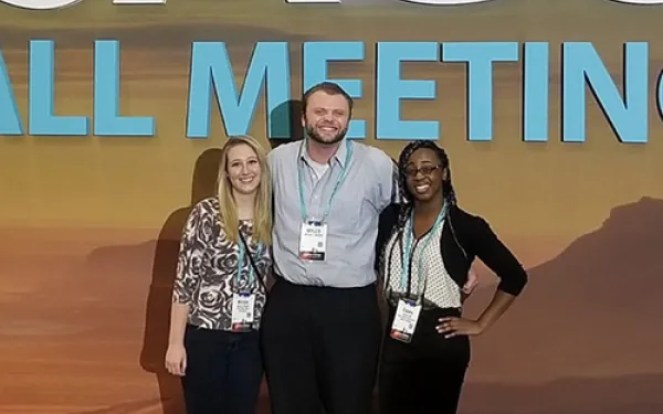 Students Nikki Kinash, Myles Moore, and Emma Oti at the American Geophysical Union Meeting Fall Meeting 