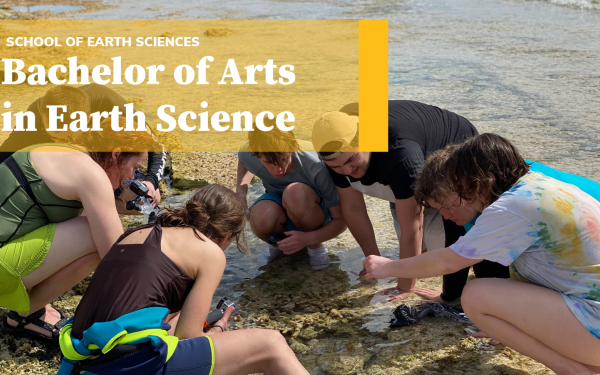A group of students inspect the contents of a body of water and a yellow banner reading "Bachelor of Arts in Earth Science" is above them