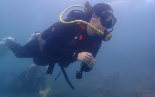 Graduate student Shannon Dixon scuba diving on a Hawaiian reef.