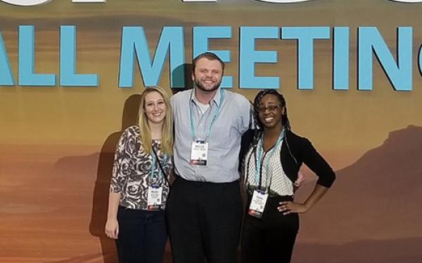 Students Nikki Kinash, Myles Moore, and Emma Oti at AGU meeting