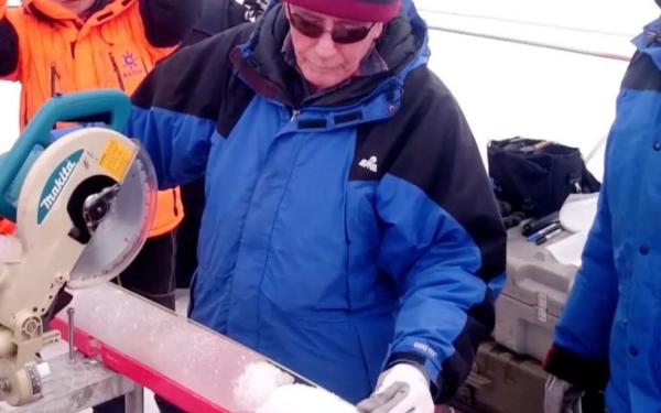 Professor Thompson cuts fresh ice core