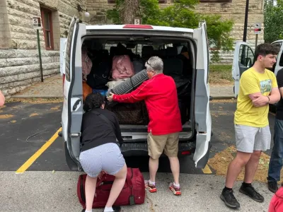 Shelley Judge packing with students before departure. 