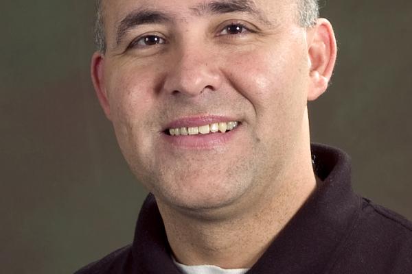 Photo of smiling Professor Ozeas Costa