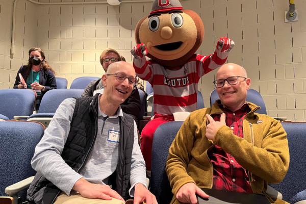 Professors Saltzman and Mark posing with Brutus