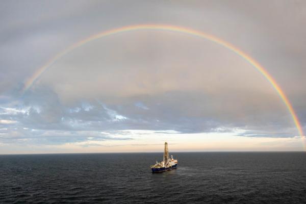 A drone captures a beautiful image of the JOIDES Resolution surrounded by a rainbow. Credit: Chris Lyons & IODP