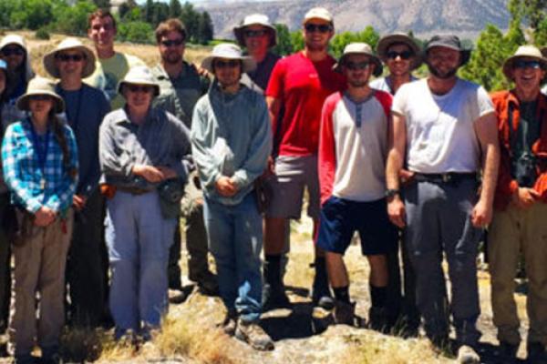 Geology majors and faculty gather behind Temple Hill during field camp. Geology majors and faculty gather behind Temple Hill during field camp.