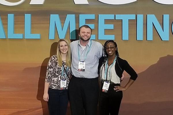 Students Nikki Kinash, Myles Moore, and Emma Oti at AGU meeting