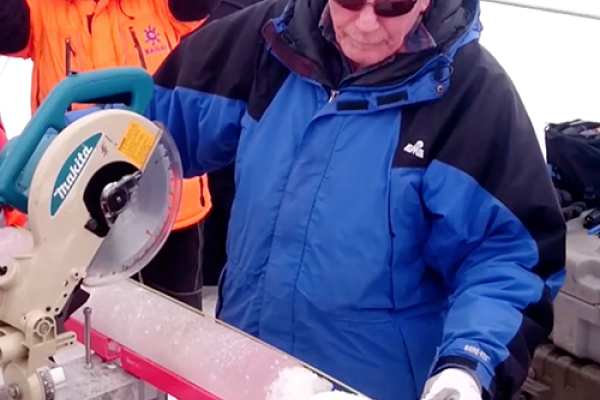 Professor Lonnie Thompson handles Tibetan ice core