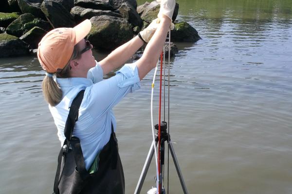 Sawyer sampling contaminants from the sea bottom.