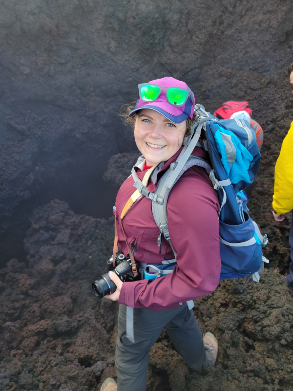 Lindsey in front of a steaming fumarole on Pacaya Volcano