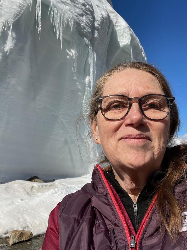Kathy standing in front of the Canada Glacier in the dry valleys of Antarctica