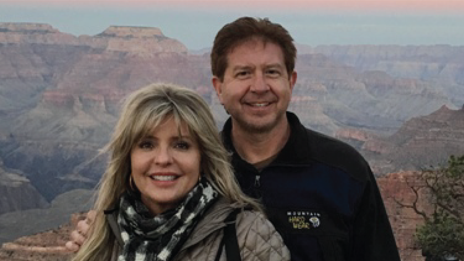 Jim Geitgey and his wife in front of the Grand Canyon