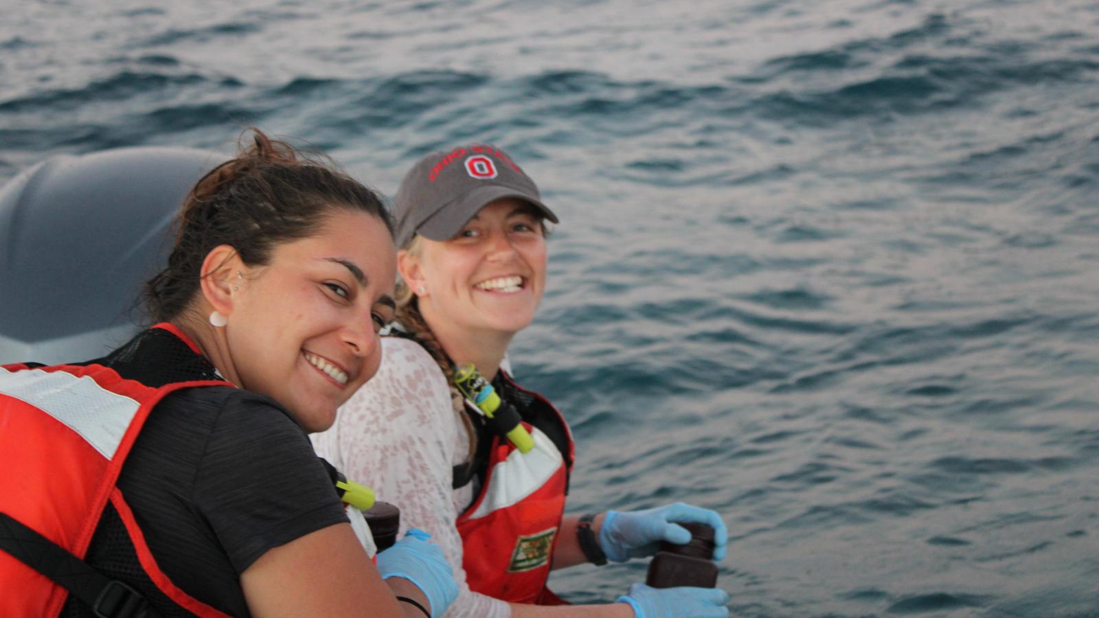 Postdoc Dr. Leila Chapron and graduate student Ann Marie Hulver collecting water samples
