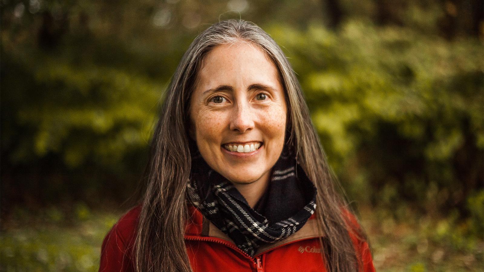 picture of Julie Crawford with forest in background