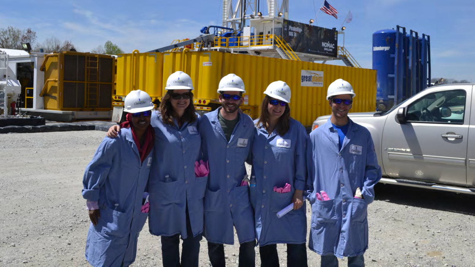 Professor Ann Cook with undergraduate and graduate students at a drilling site.