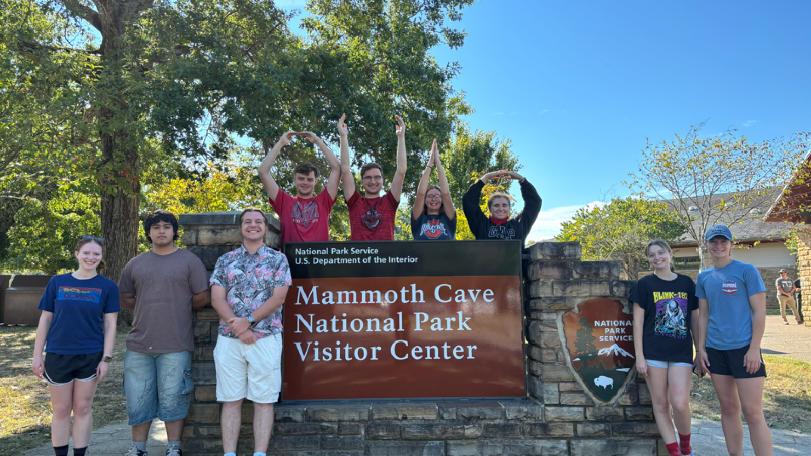 The Geology Club visits Mammoth Cave National Park and spells out O-H-I-O at the park sign.