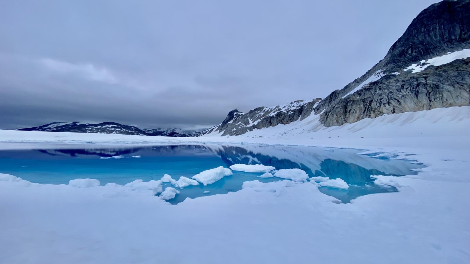 A surface water glacial melt pond on the Juneau Icefield