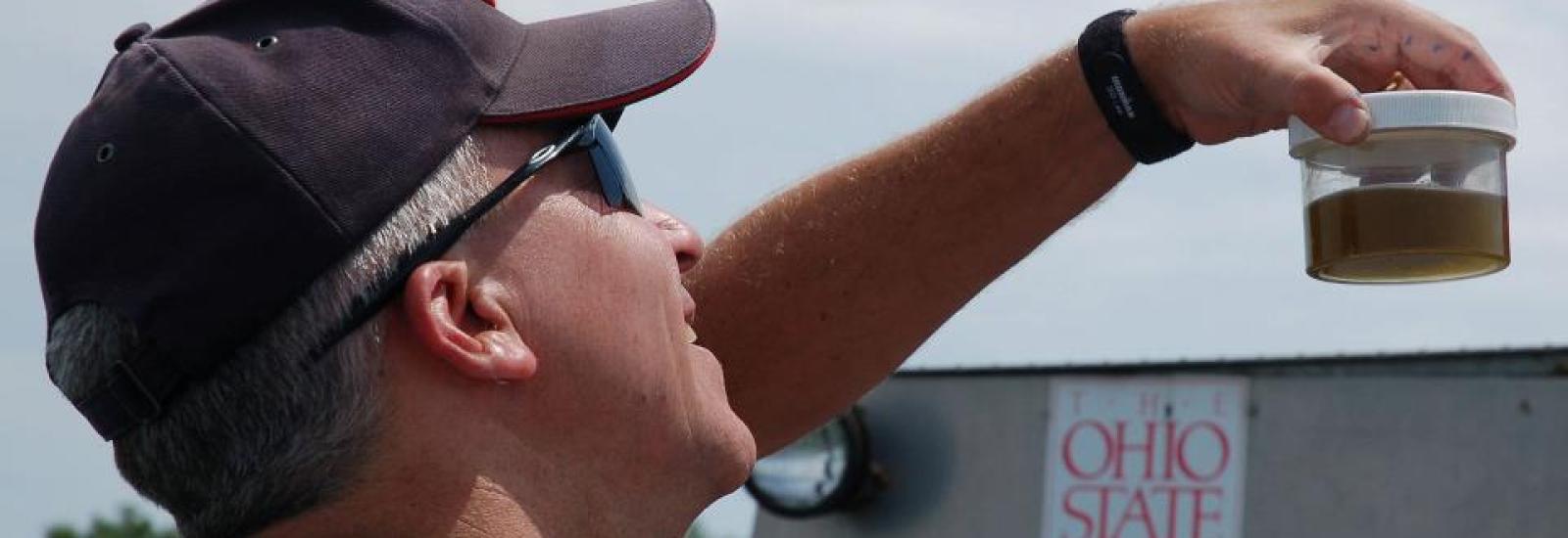 Professor Larry Krissek teaching on Lake Eerie