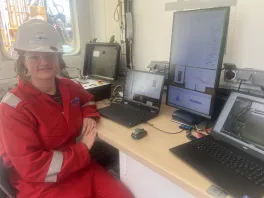 Professor Cook in the well logging shack as well logging data is collected offshore Martha's Vineyard. 