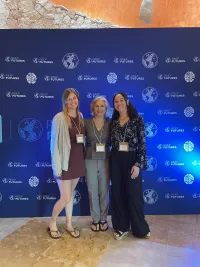 Professor Andrea Grottoli and her team, PhD candidate Shannon Dixon and postdoc Dr. Ann Marie Hulver, at the Reef Futures 2024 conference in Mexico 9-13 December 2024.